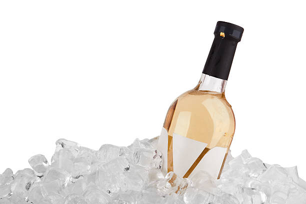 wine White wine bottle in ice isolated on white background uncork wine stock pictures, royalty-free photos & images