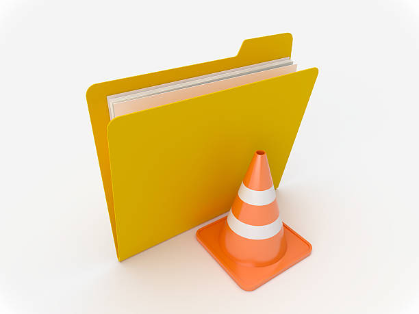 Yellow Folder With Traffic Cone stock photo