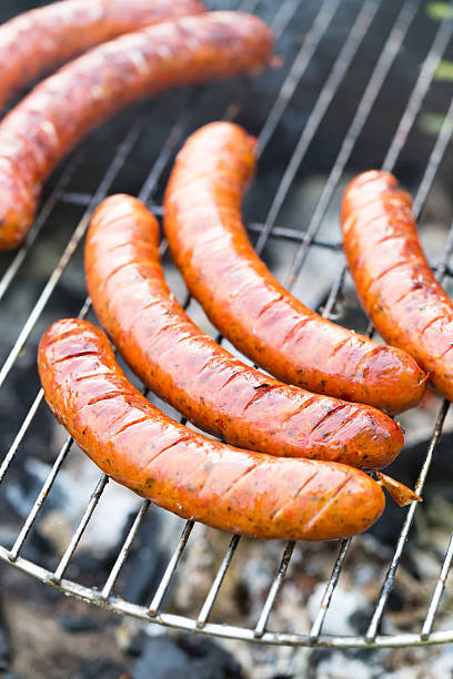 istock Tasty polish sausage on grill 493597764