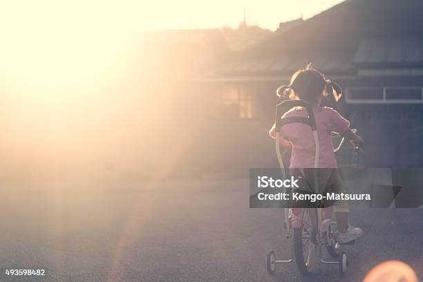 Bicycle Kid Of The Sunset Stock Photo - Download Image Now - Childhood, Memories, Nostalgia