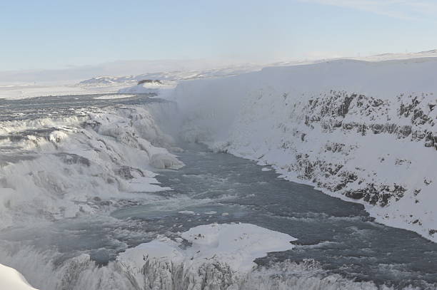 Frozen river above Iceland's Gulfoss waterfall Snow and ice cover this river flowing into Iceland's Gulfoss waterfall. This is part of Iceland's 'Golden Circle'. frozen river stock pictures, royalty-free photos & images