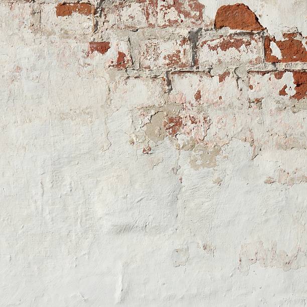 istock Old Vinyage Red Brick Wall With Sprinkled White Plaster Texture 493604392