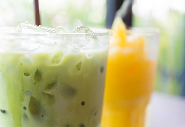 istock Ice green tea and orange juice 493604542