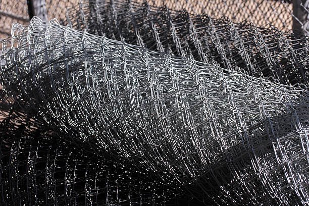 istock outdoor building materials: rolls of chain link fence 493605524