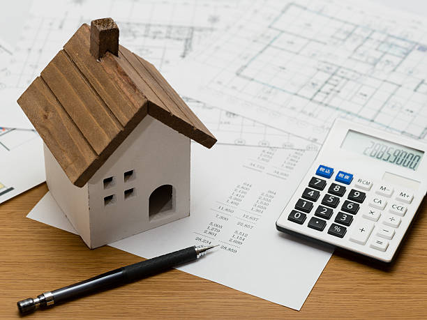 istock Estimating construction costs of a house 493607140