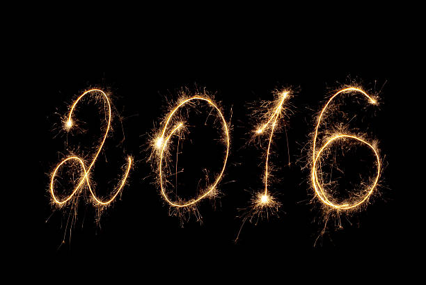 istock Happy New Year 2016. Inscription sparklers on dark background. 493607716