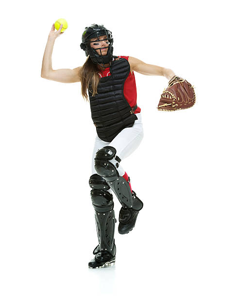 catcher lanciare una palla - softball adult catching beautiful foto e immagini stock