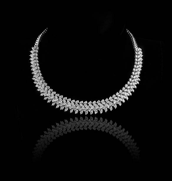 istock diamonds necklace shot against a black background 493610343