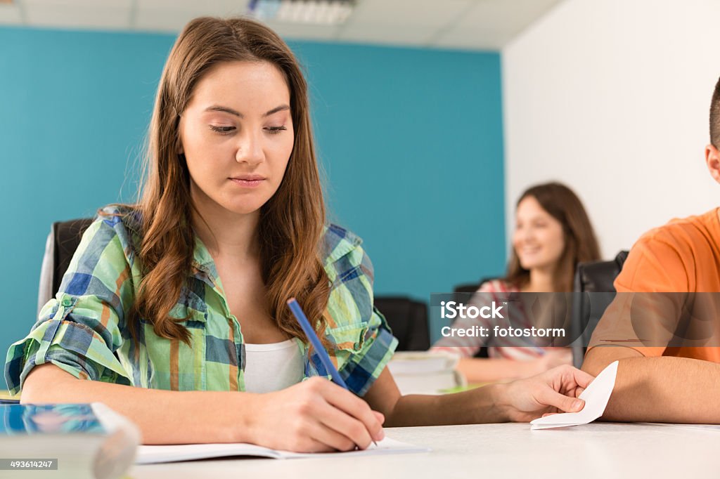 Students Passing Notes In Class Student Passing Notes During Class Stock Photo - Download Image Now ...