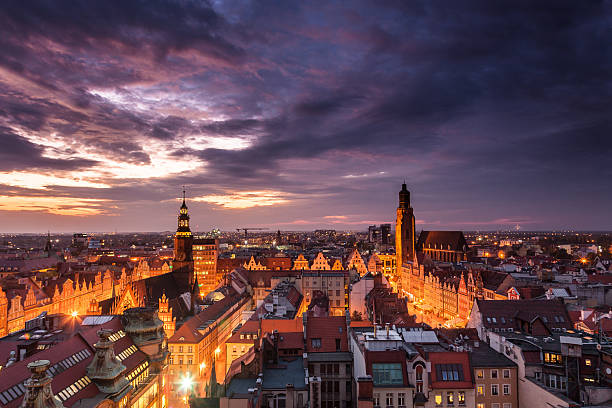 Illuminated city skyline at night, Wroclaw, Poland, Europe. stock photo