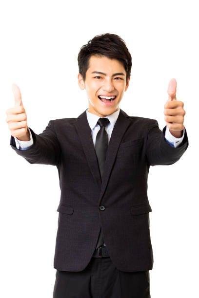 istock young business man with thumbs up gesture 493621910