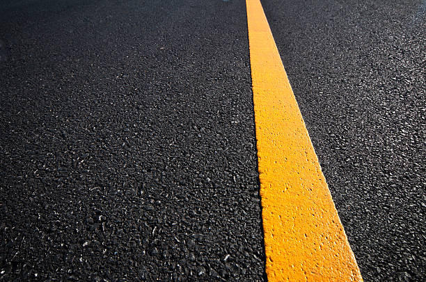 istock Asphalt road with separation yellow lines 493623024