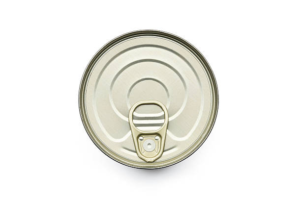 TIN CAN LID TOP ON WHITE Overhead, birds eye view of a tin or can of food on a white background with a subtle shadow area grounding the product. The object has been cut out with a clipping path. can photos stock pictures, royalty-free photos & images