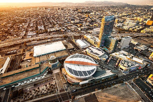 Aerial view of Staples Center in Los Angeles and surrounding area at sunset. Many details visible in the image.