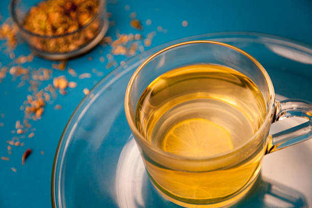 istock Cup of Herbal Tea on blue Background 493629676