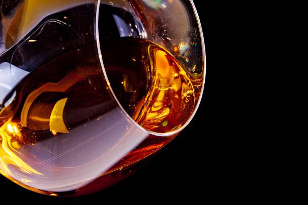 snifter of brandy in elegant glass with space for text