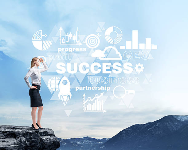 istock woman in formal clothes on the rock 493632178