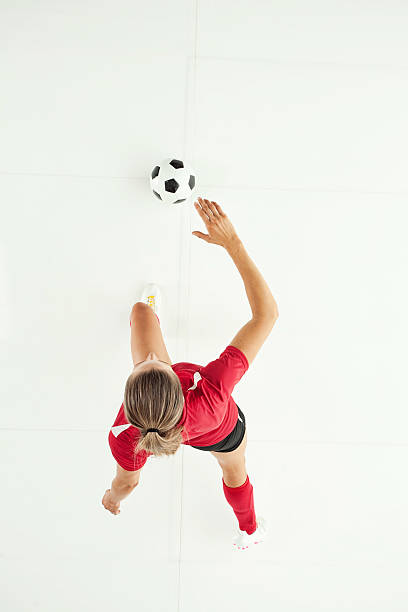 Above view of female soccer player playing