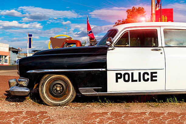 Seattle, USA - March 4, 2013: Original 1970s Plymouth Satellite Police car on the corner of Pike and 1st ave just before sunset.