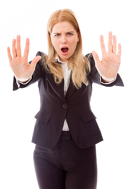 istock Businesswoman stopping with hand gesture 493632367