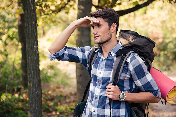 istock Portrait of a man with marching backpack 493632416