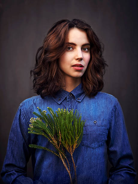 istock Keeping nature close to her heart 493633556
