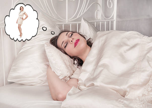 Plus size woman sleeping and dreaming about slim herself stock photo