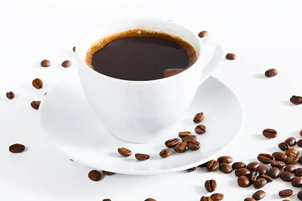 Photo of natural black coffee in a white cup