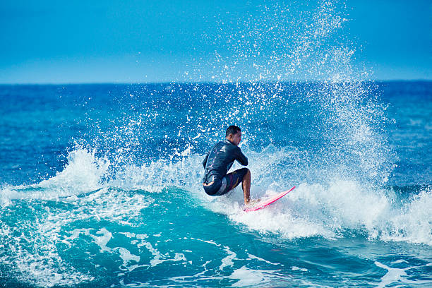 istock Surfing in Kauai Hawaii 493647884