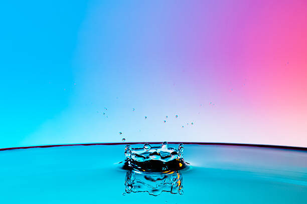 istock Drops of water falling shattered. 493647916