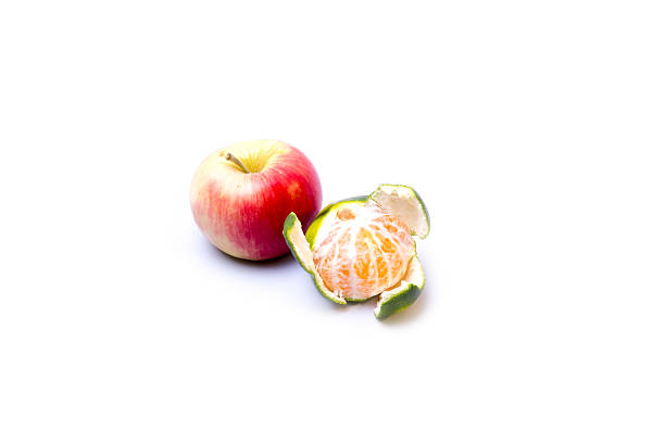 apple und mandarin - питательные stock-fotos und bilder