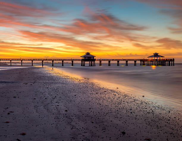 istock Fort Myers pier at dawn from the beach 493648980