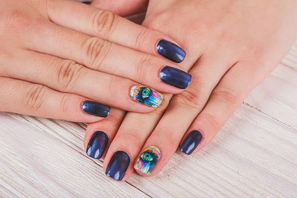 istock Dark blue nail art with print eye 493649052