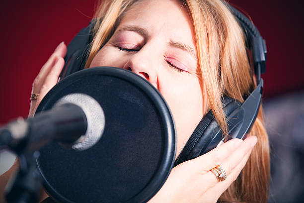 istock Woman Singer In Studio Recording 493652834
