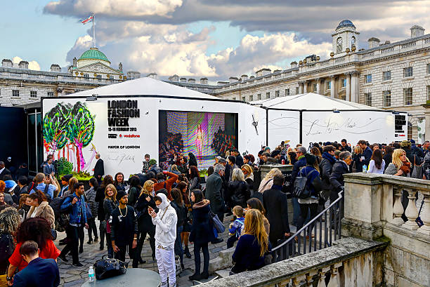 London Fashion Week London, United Kingdom - February 14, 2013: Crowd of people in Somerset House for London Fashion Week.  london fashion week stock pictures, royalty-free photos & images