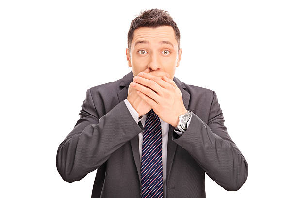 istock Shocked businessman covering his mouth 493652936