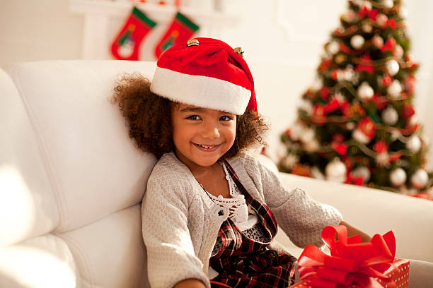 istock Little girl with Christmas present 493653086