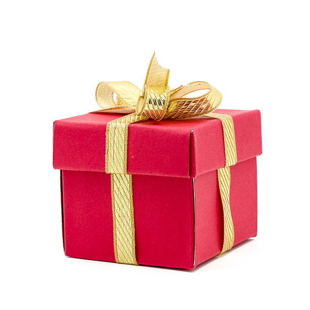 istock christmas gift box with a gold ribbon bow 493653092