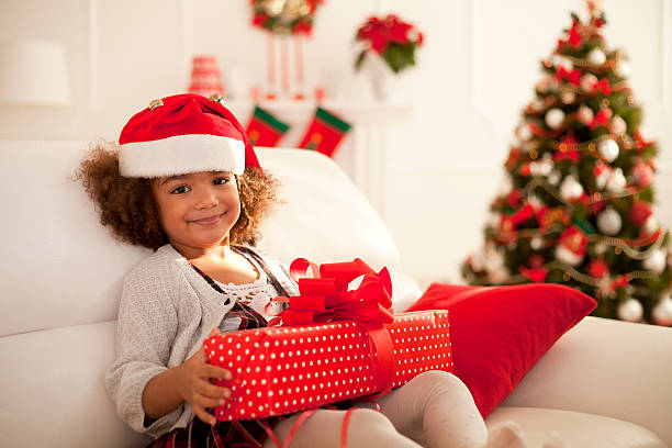 istock Little girl with Christmas present 493653206