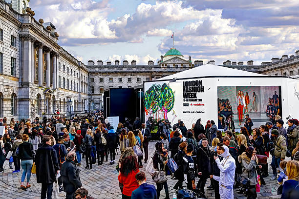 London Fashion Week London, United Kingdom - February 14, 2013: Crowd of people in Somerset House for London Fashion Week.  london fashion week stock pictures, royalty-free photos & images