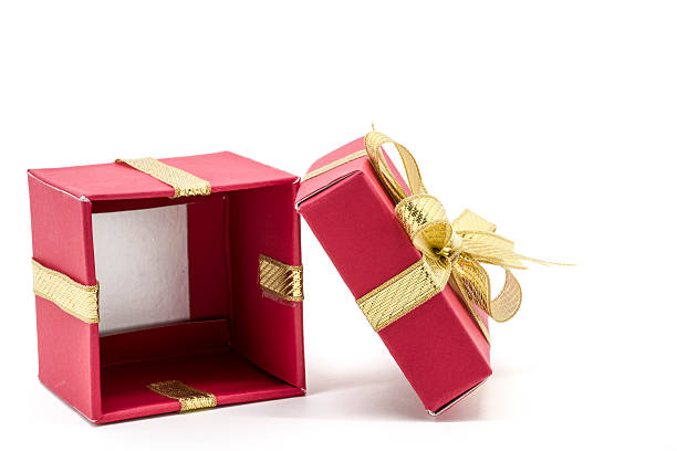 istock christmas gift box with a gold ribbon bow 493653550