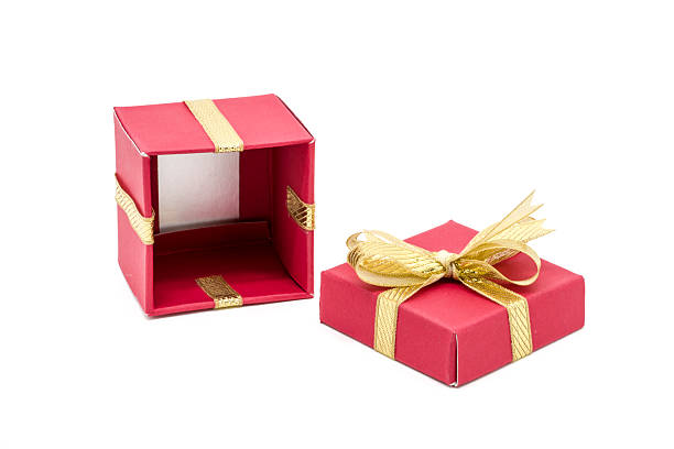 istock christmas gift box with a gold ribbon bow 493653688
