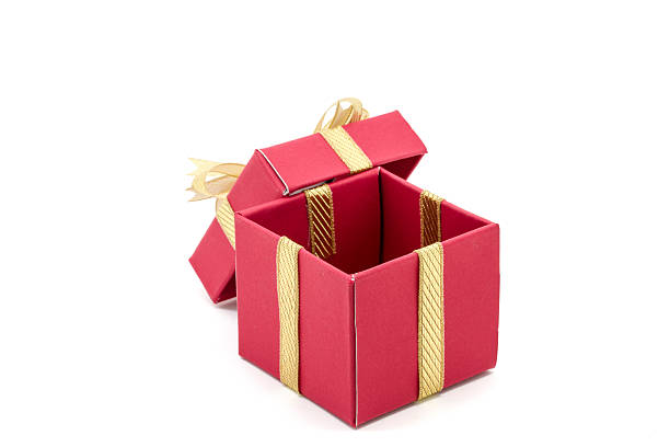istock christmas gift box with a gold ribbon bow 493654088