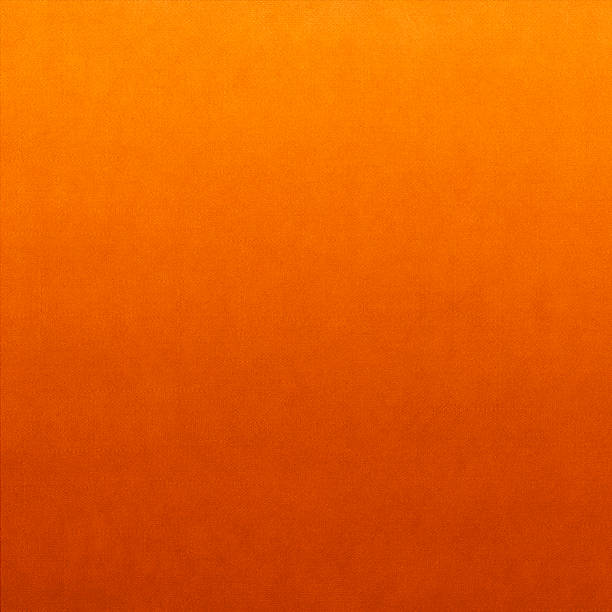 istock Classic fabric soft textured gradient background in bright orange colour 493654216