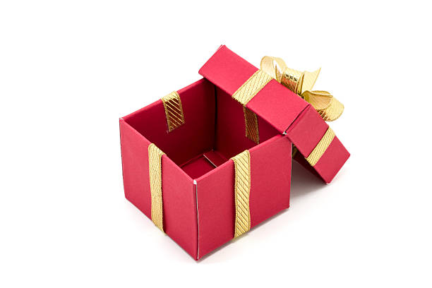 istock christmas gift box with a gold ribbon bow 493654864