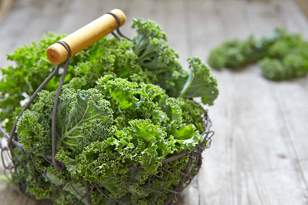 istock Fresh green kale leaves 493656176