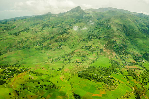Highlands surrounding Addis Ababa Highlands surrounding Addis Ababa covered with lush green grass and vegetation addis ababa ethiopia photos stock pictures, royalty-free photos & images