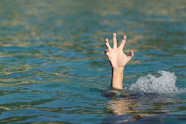 istock Hand of a man drowning in the sea 493658764