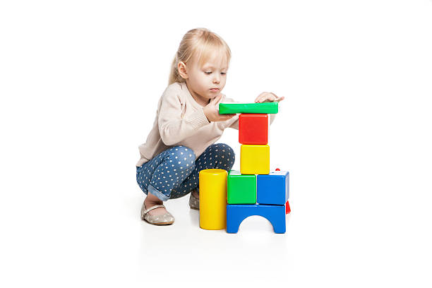 istock Baby girl building from toy blocks 493659898