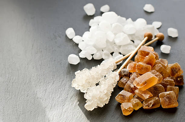 Navat is a special sugar that crystallizes in a special way. It is served for tea, sometimes it is replaced by simple sugar or caramel candy. Navat is made from condensed sugar syrup or from grape juice. Special spices are added to it. The boiling syrup is poured into huge cauldrons with strands stretched horizontally. Around these threads the crystals of sugar are formed. Navat can be of different colors: from whitish to saturated brown. This Uzbek sweet product is added to tea or simply sucked in the mouth.